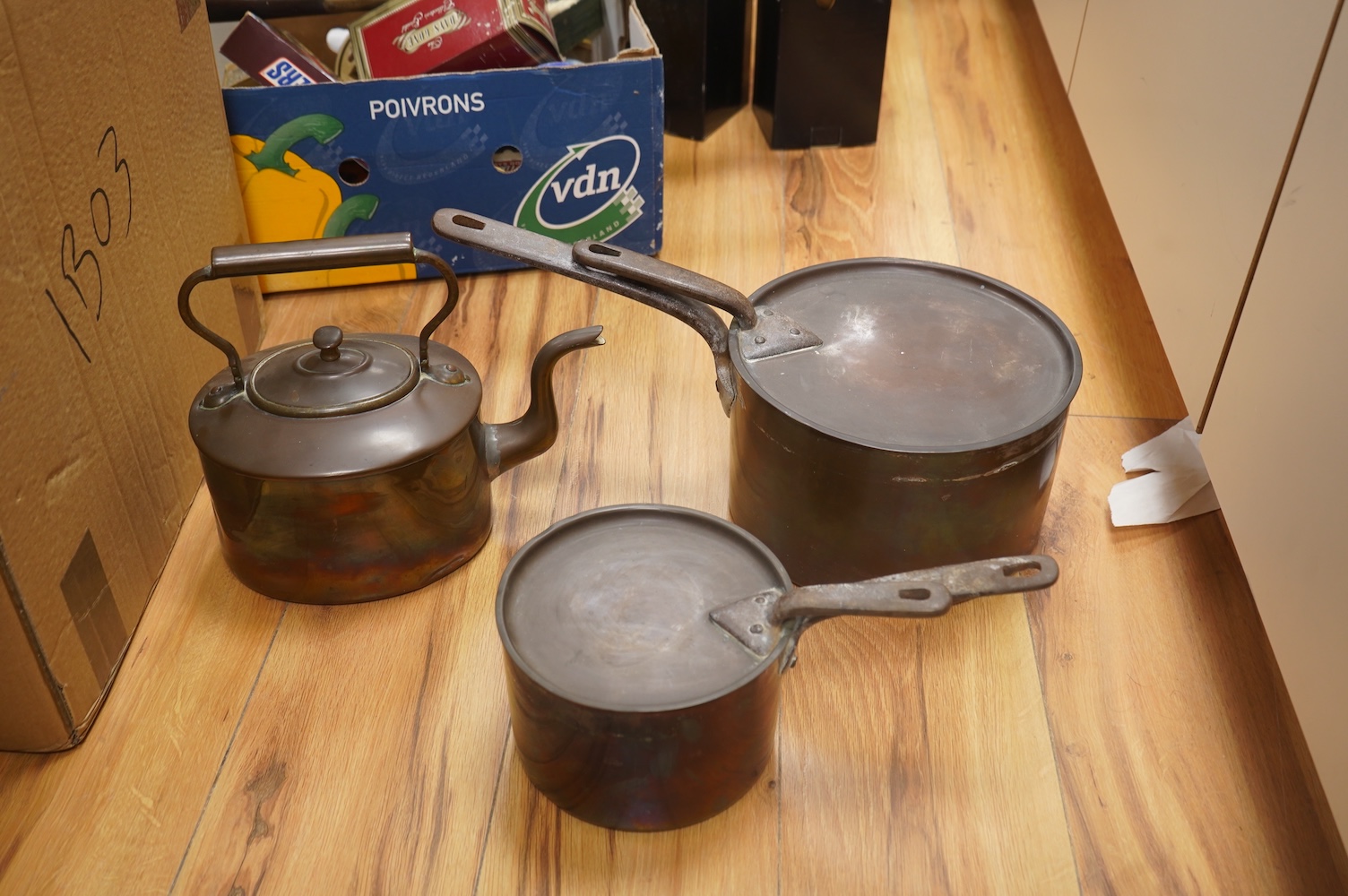Two Benham & Froud copper saucepans and a copper kettle, largest 43cm in length